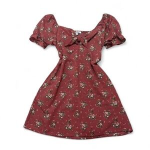 Mauve floral baby doll dress tie front, puff  sleeves, smocked back and pocket